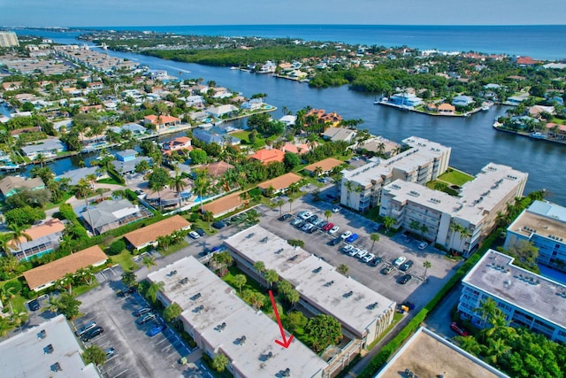 drone / aerial view featuring a water view