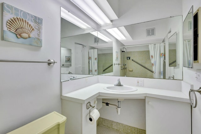 bathroom with sink and walk in shower