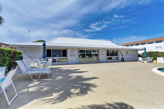 view of front of property featuring a patio area