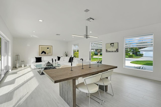 playroom with light hardwood / wood-style flooring and plenty of natural light