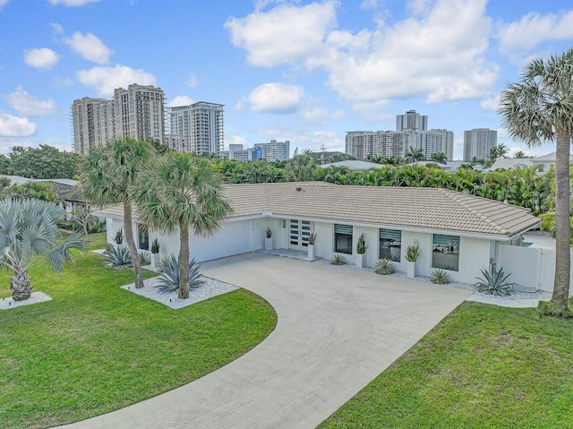 view of front of home featuring a front lawn