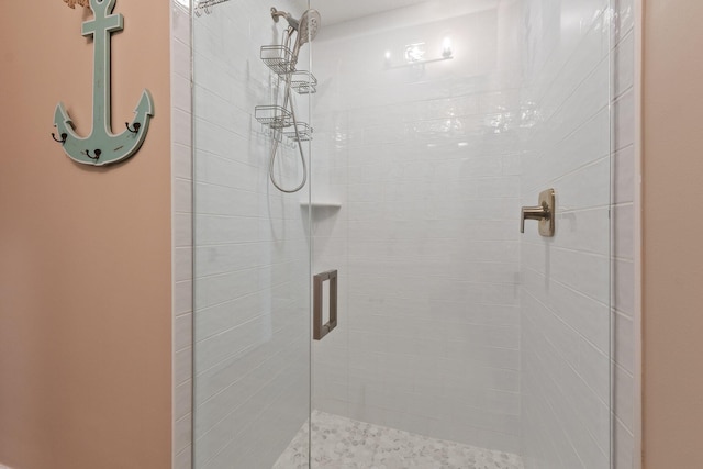 bathroom featuring an enclosed shower