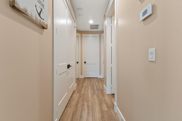 corridor featuring light wood-type flooring