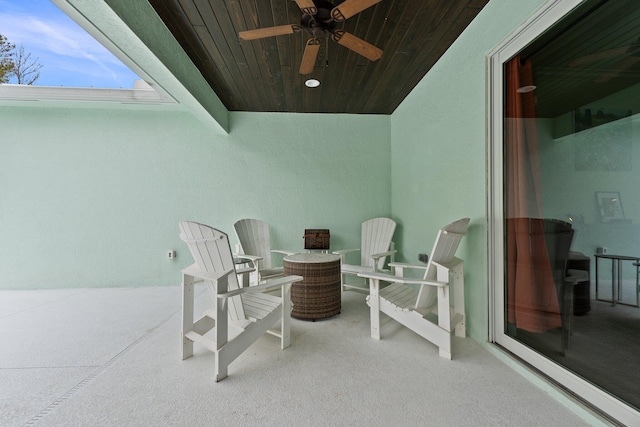 view of patio featuring ceiling fan