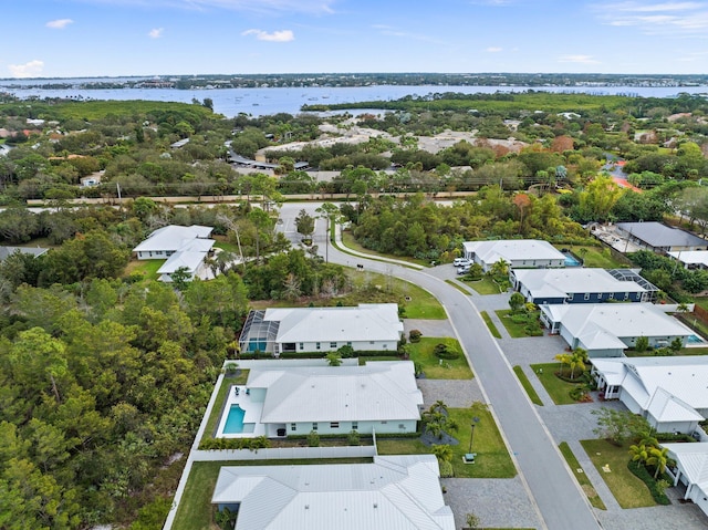 bird's eye view with a water view