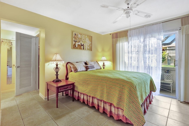 bedroom with light tile patterned floors, access to exterior, and ceiling fan