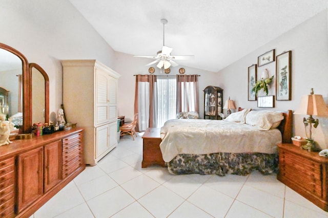 bedroom featuring vaulted ceiling, a ceiling fan, and light tile patterned flooring