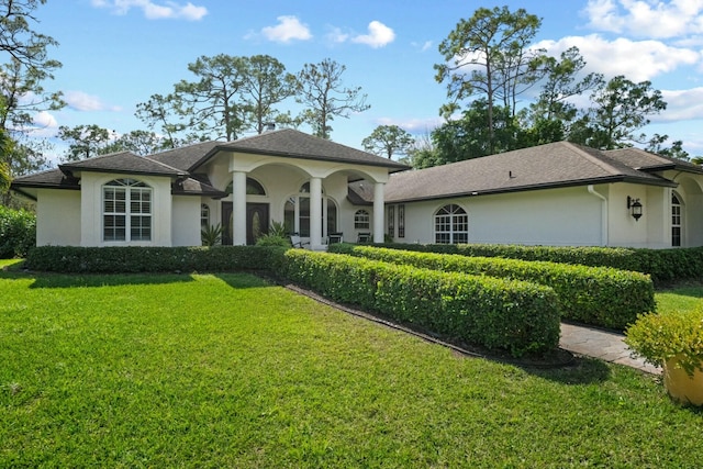 view of front facade featuring a front yard