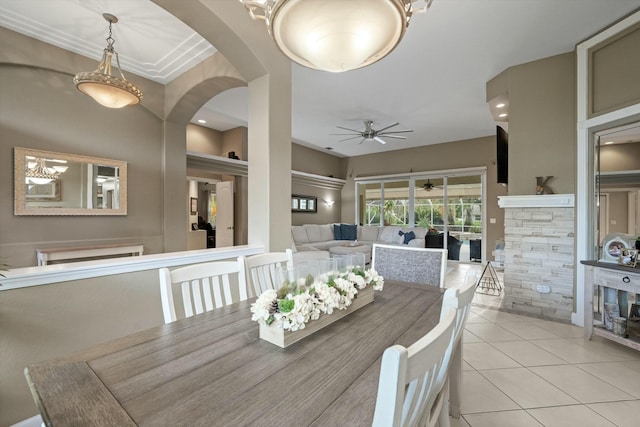 dining room featuring light tile patterned floors and ceiling fan