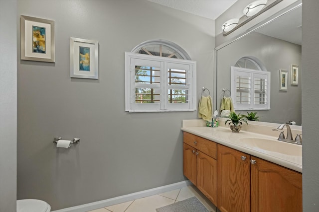 bathroom with vanity and tile patterned floors