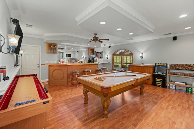 rec room featuring crown molding, billiards, ceiling fan, light wood-type flooring, and indoor bar