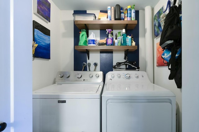 washroom featuring washing machine and dryer