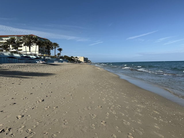 view of water feature featuring a view of the beach