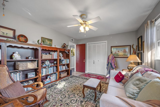 living room with ceiling fan