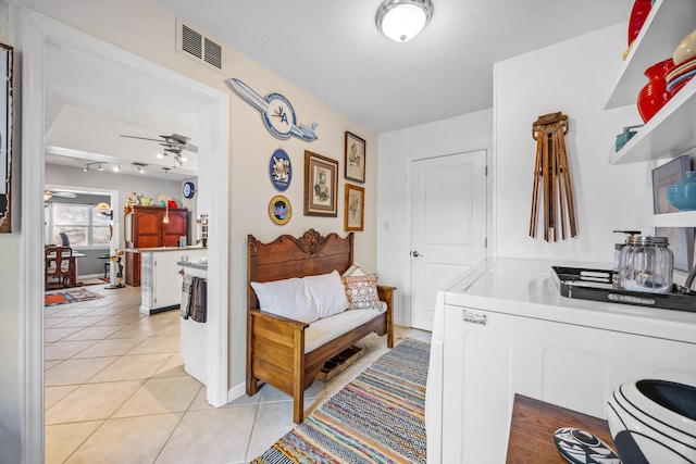 interior space featuring light tile patterned floors