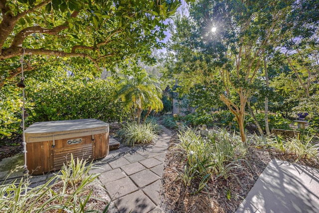 view of patio with a hot tub