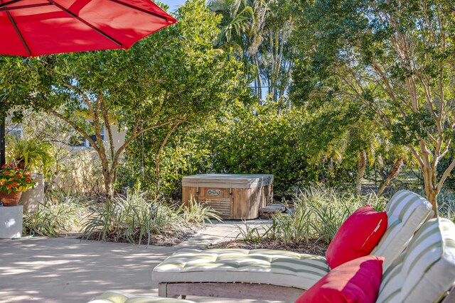 view of patio / terrace featuring a hot tub