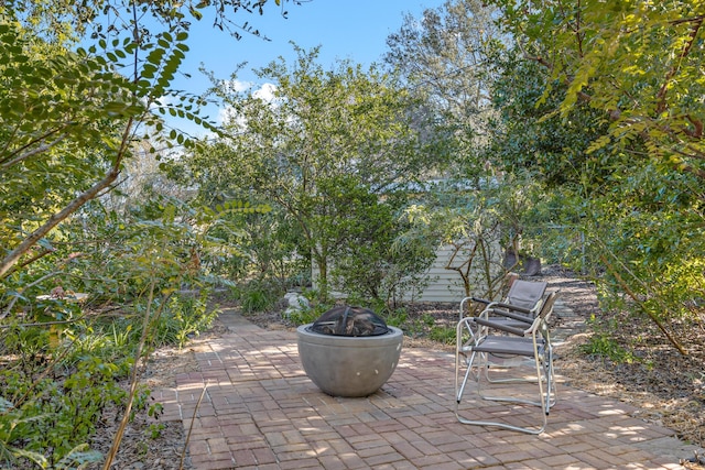 view of patio featuring a fire pit