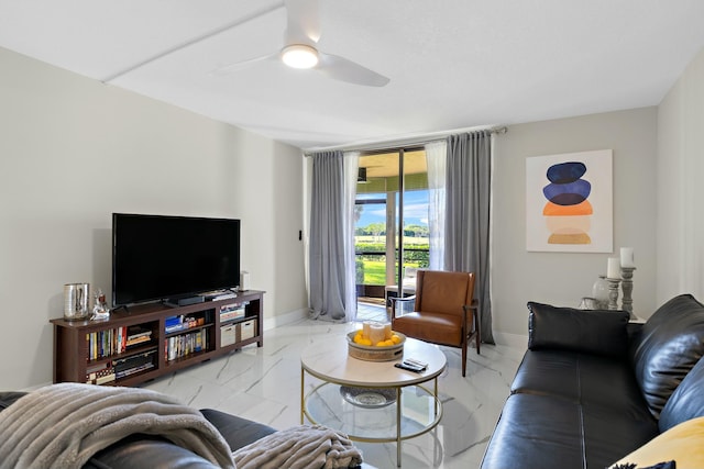 living room featuring ceiling fan