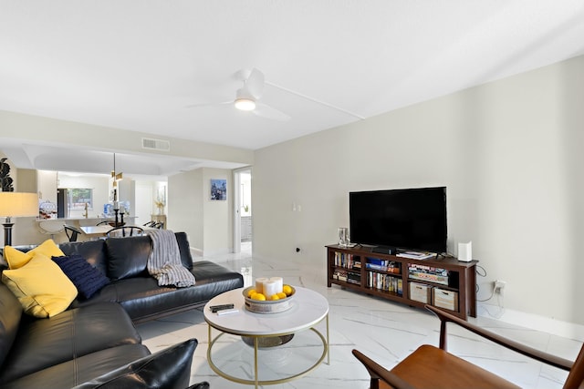 living room featuring ceiling fan