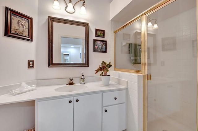 bathroom with vanity and walk in shower