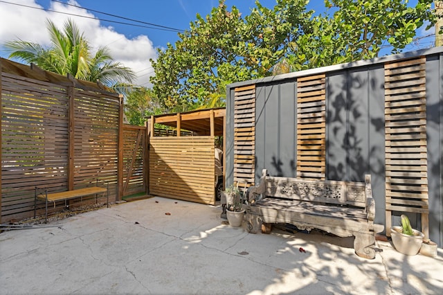 view of patio / terrace featuring a storage shed