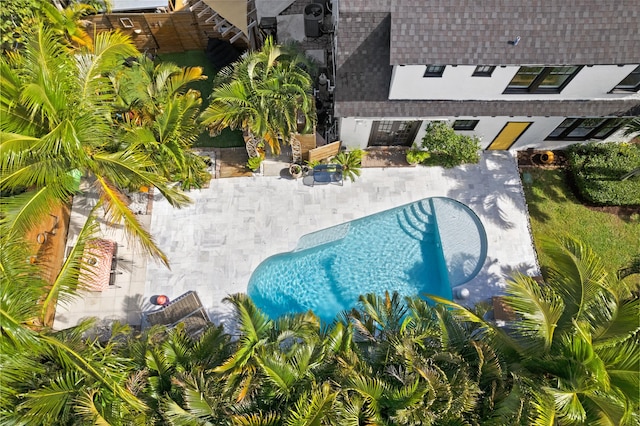 view of swimming pool with a patio