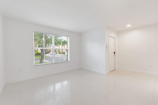 view of tiled spare room