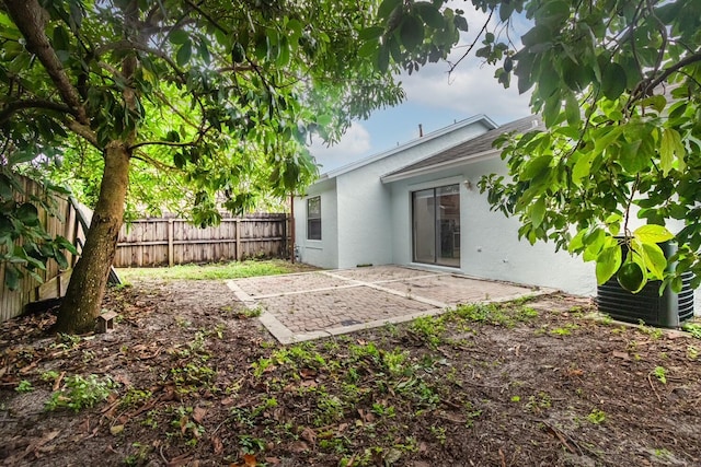 back of property with a patio area