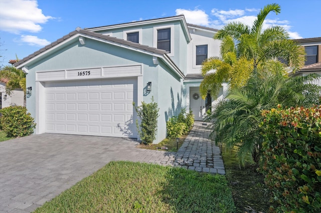 view of front of home with a garage