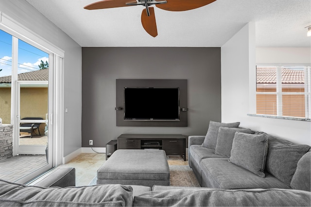 living room featuring ceiling fan