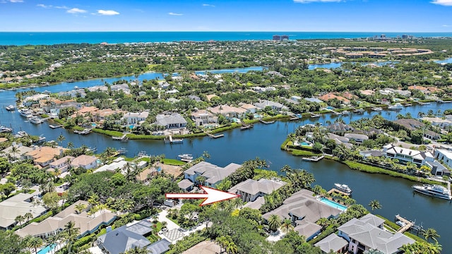 177 Commodore Dr, Jupiter, FL 33477 - aerial view of residential area featuring a large body of water