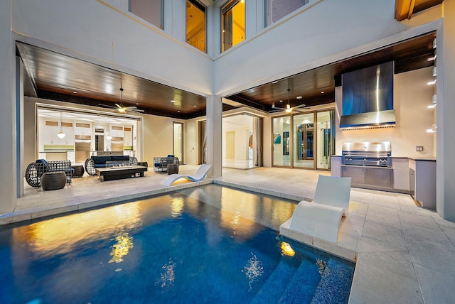 177 Commodore Dr, Jupiter, FL 33477 - outdoor pool with grilling area and ceiling fan