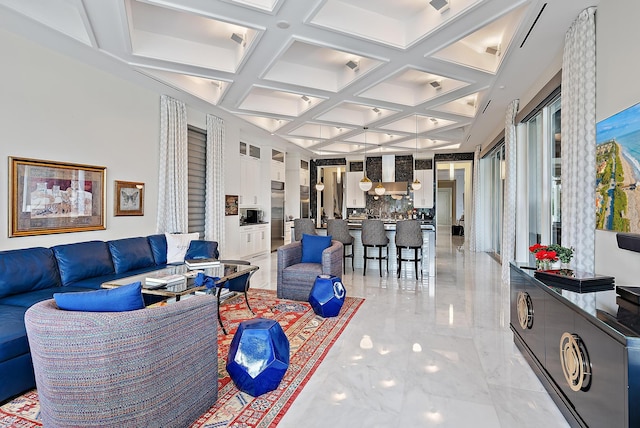 living room with beamed ceiling, marble finish floor, and coffered ceiling