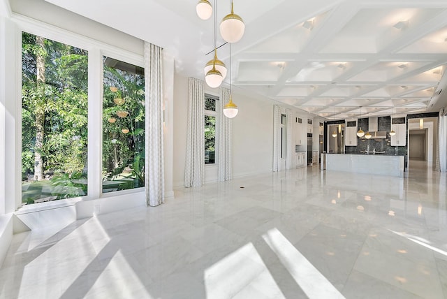 177 Commodore Dr, Jupiter, FL 33477 - unfurnished room featuring coffered ceiling, light marble finish flooring, and beamed ceiling
