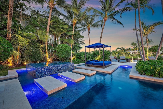 177 Commodore Dr, Jupiter, FL 33477 - outdoor pool with an in-ground hot tub and a patio area