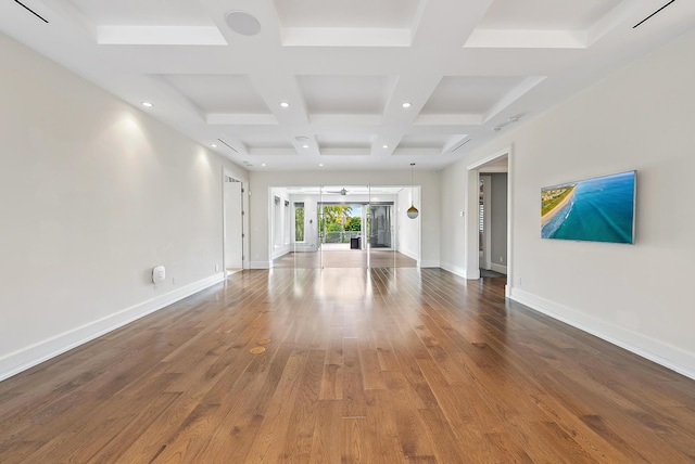177 Commodore Dr, Jupiter, FL 33477 - spare room featuring coffered ceiling, wood finished floors, baseboards, beamed ceiling, and recessed lighting