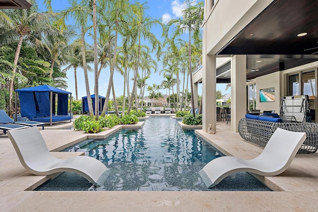 outdoor pool with a patio