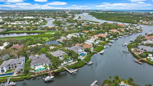 177 Commodore Dr, Jupiter, FL 33477 - aerial overview of property's location with a nearby body of water and nearby suburban area