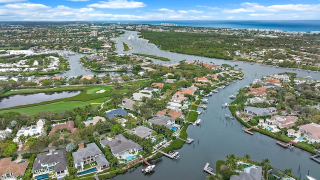 177 Commodore Dr, Jupiter, FL 33477 - aerial view of property's location featuring a large body of water, nearby suburban area, and a local golf course