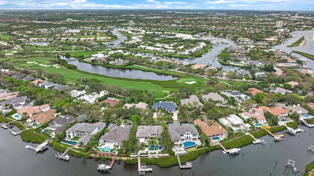 177 Commodore Dr, Jupiter, FL 33477 - aerial view of property's location with nearby suburban area, a nearby body of water, and a local golf course