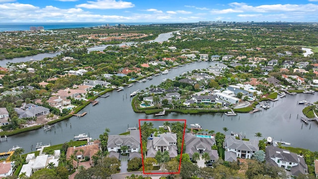 177 Commodore Dr, Jupiter, FL 33477 - aerial view of residential area with a large body of water and property boundaries highlighted