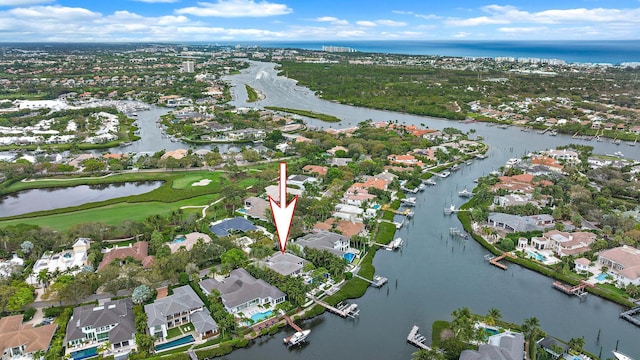 aerial view with a residential view and a water view