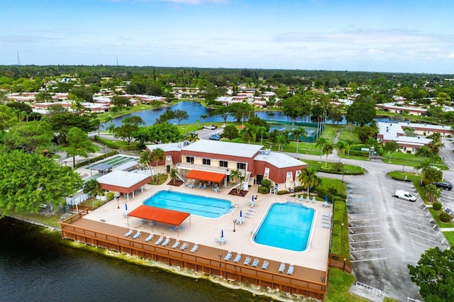 drone / aerial view with a water view