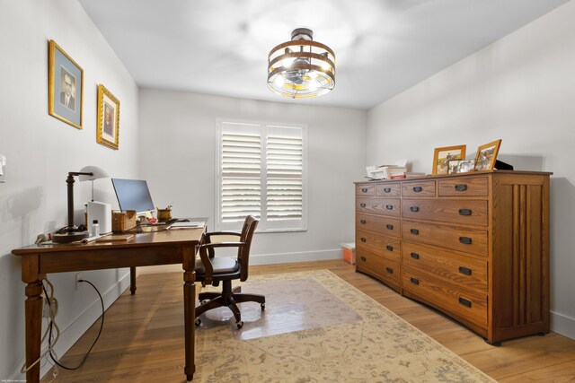 office space with hardwood / wood-style flooring