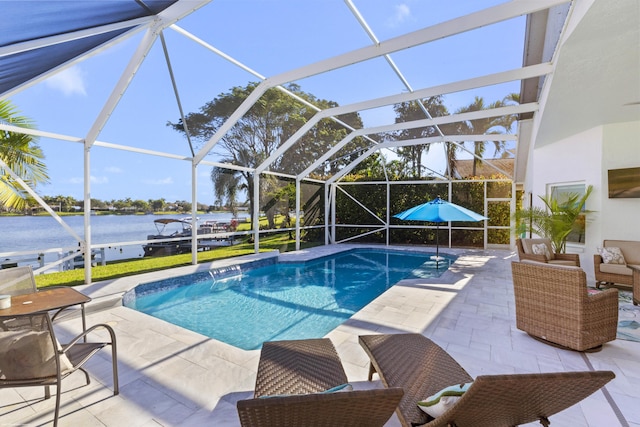 view of pool featuring a water view, a patio, an outdoor hangout area, and glass enclosure