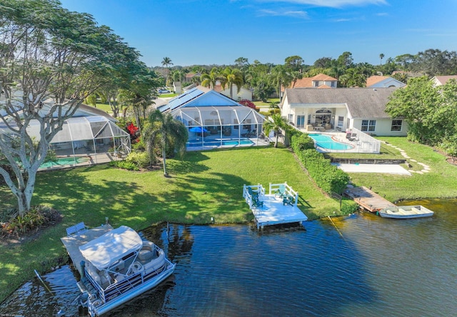 drone / aerial view with a water view