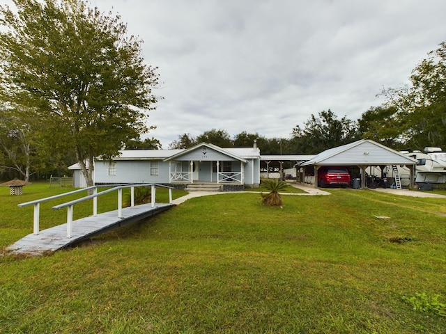 view of front of property with a front lawn and covered porch