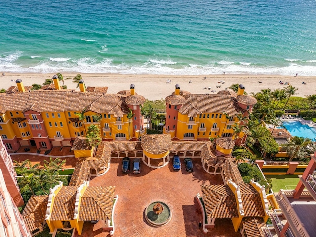 drone / aerial view with a view of the beach and a water view