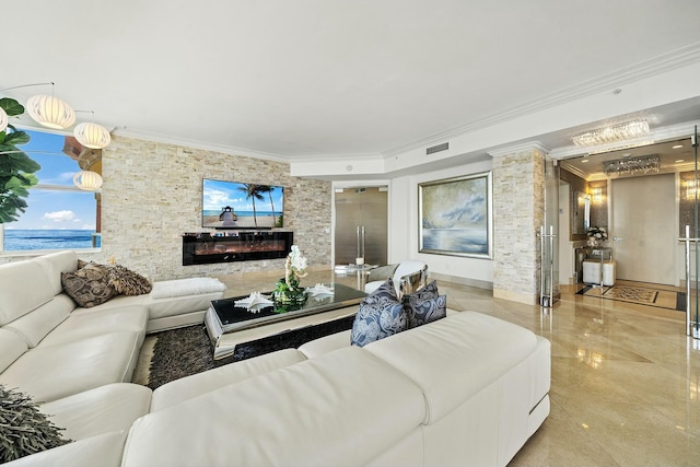 living room with a water view and crown molding